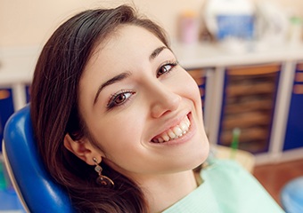 Smiling woman in dental chair