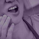 Patient holding jaw in pain