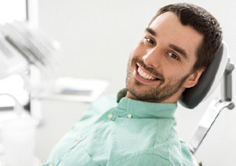 Smiling patient at appointment with Delta Dental Dentist in Columbia