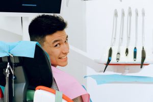 Smiling man in dentist’s chair